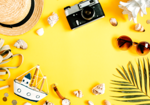 Flatlay of travel items for international job sites